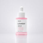 A bottle of LOVARAY PDRN PINK Face Serum with a white dropper cap and a pink liquid visible inside a clear bottle, set against a clean white background with a soft reflection.